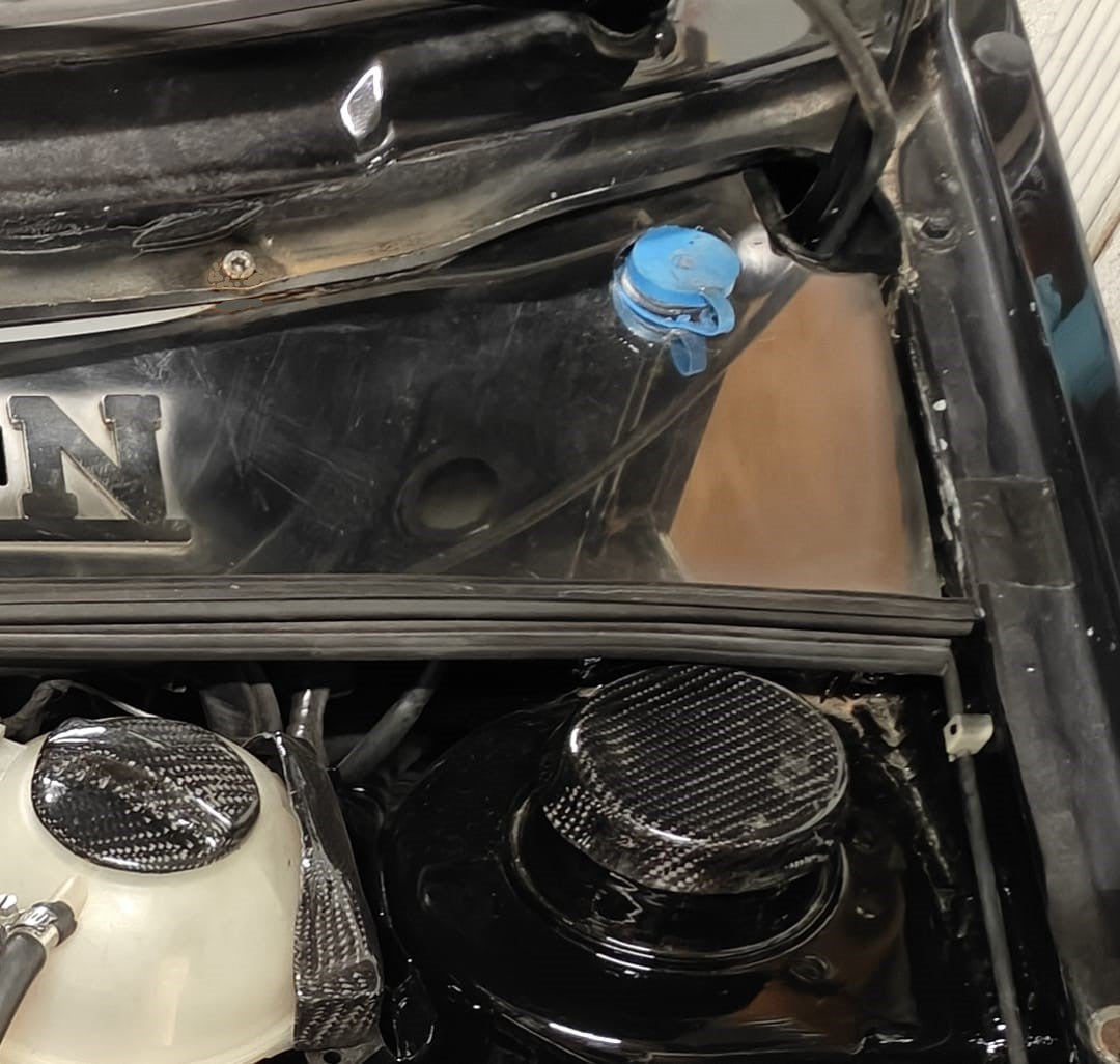 B.Custom MK2 windshield washer bottle relocation