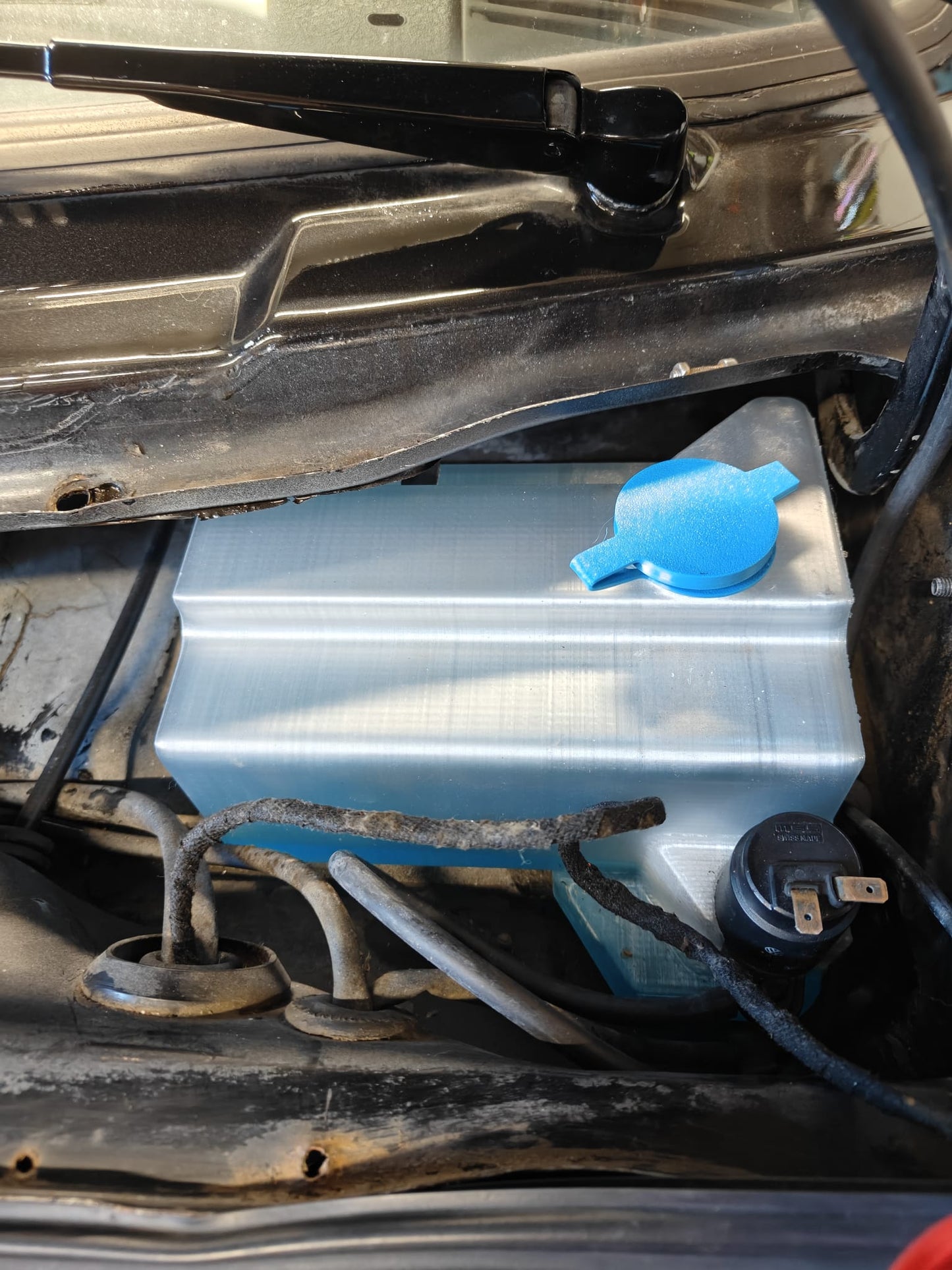 B.Custom MK2 windshield washer bottle relocation